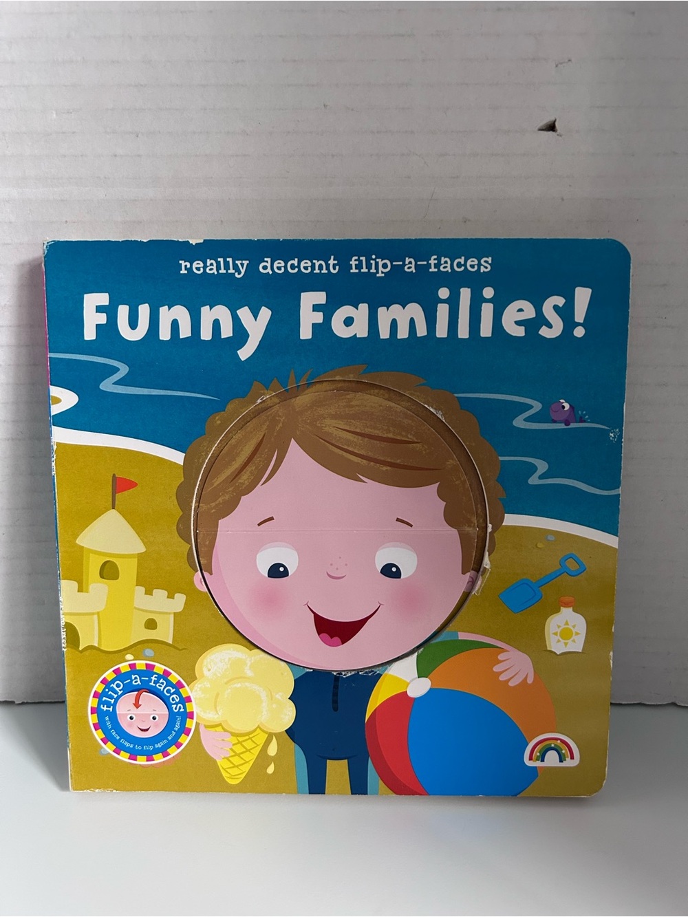 Funny Families! Flip-a-Faces Board Book